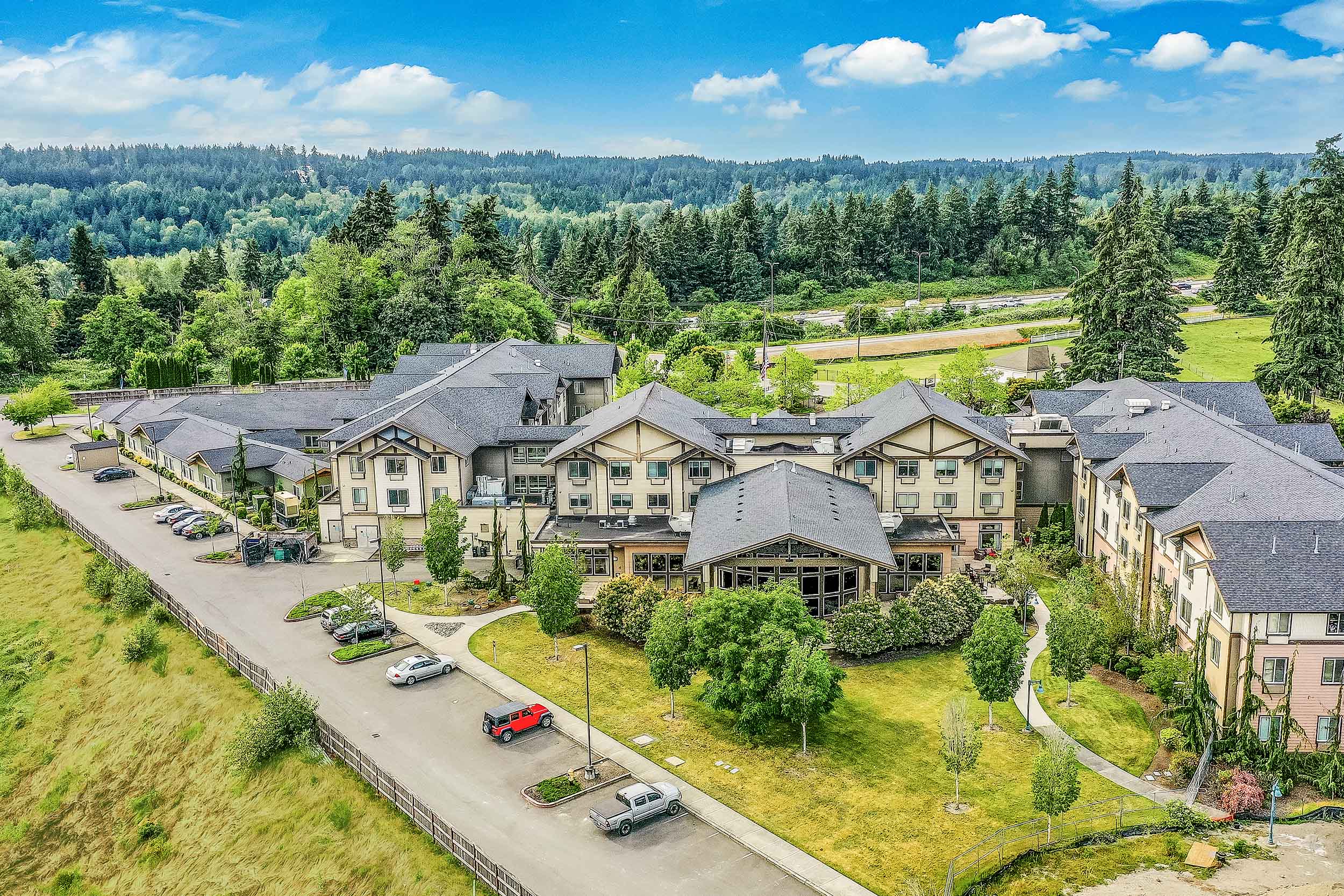 aerial view of property and surrounding mountains