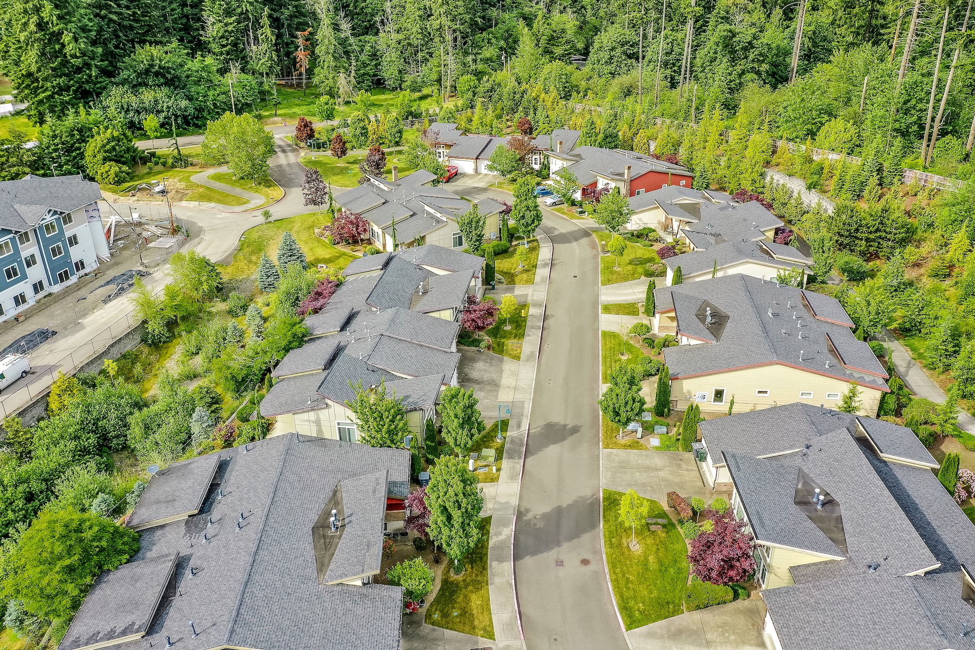 aerial view of property and surrounding mountains